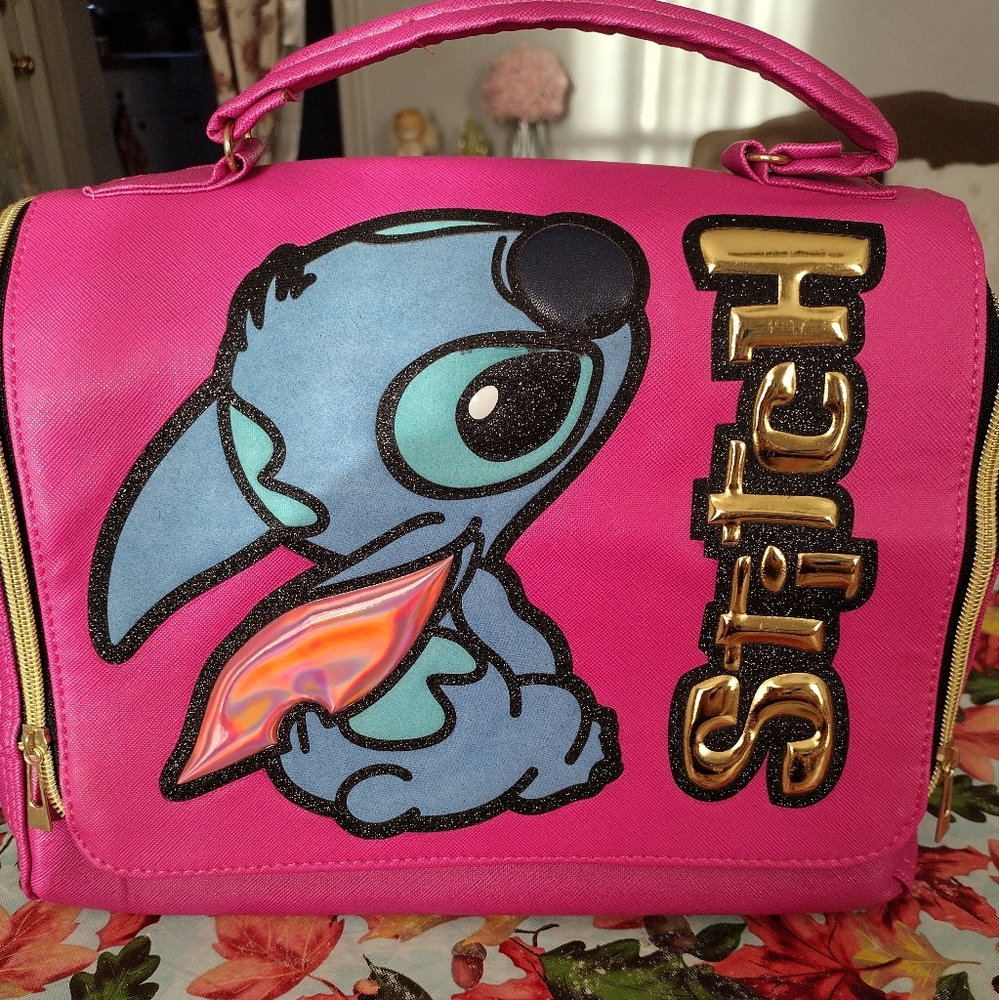 Stitch makeup and handbag and wallet three in one